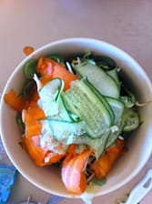 carrot and cucumber finely sliced with a vegetable peeler