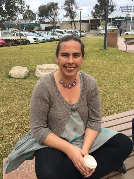 smiling sarah sitting in the park - my health zest about us