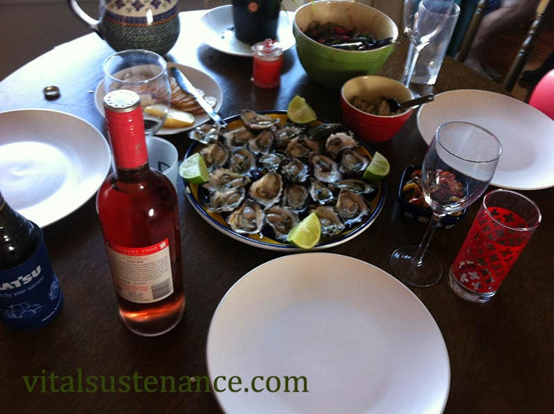 table laid with wine and oysters - alcohol free days